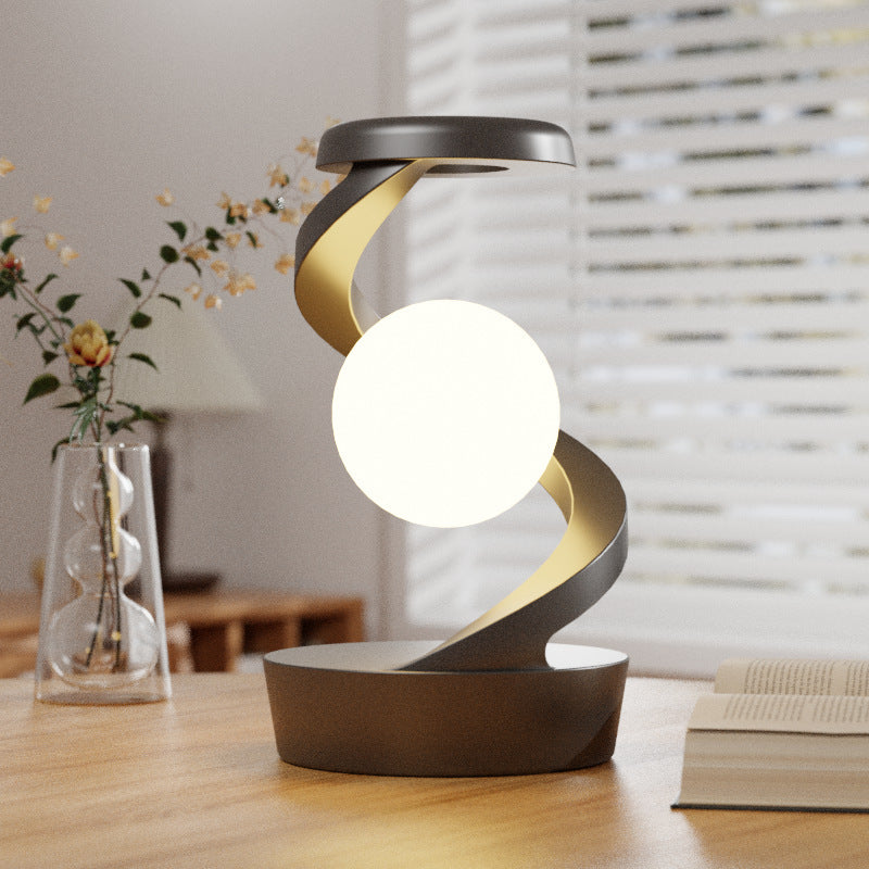 Rotierende Aufhängung Tischlampe kabelloses Laden
